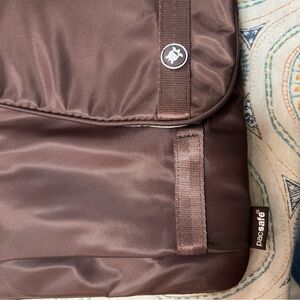 Passage  brown cross body travel purse. Anti theft. Lightweight brown. NWOT